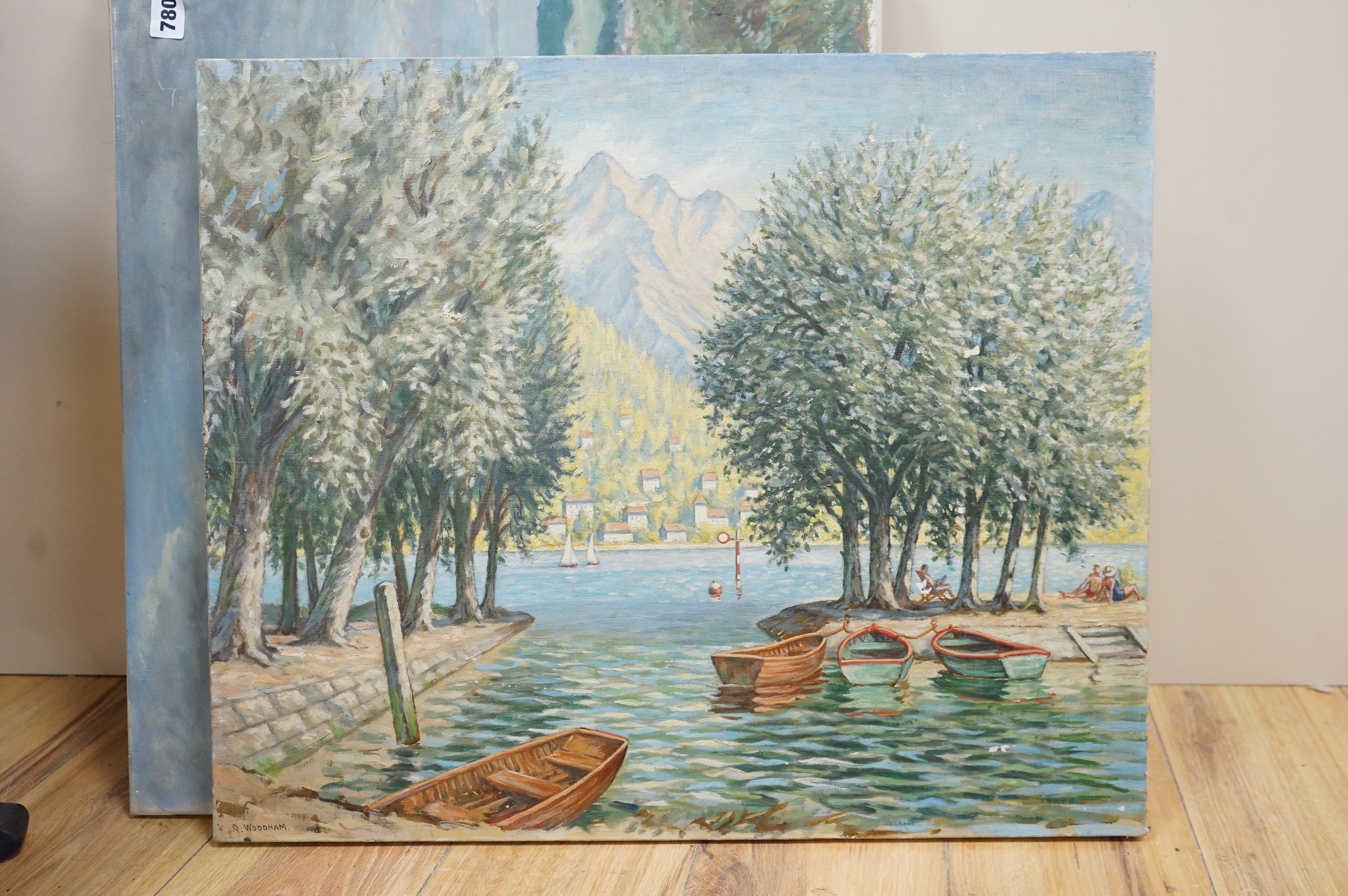 R. Woodnam, Continental landscape with moored boats, signed, oil on canvas, unframed, 51 x 61cm